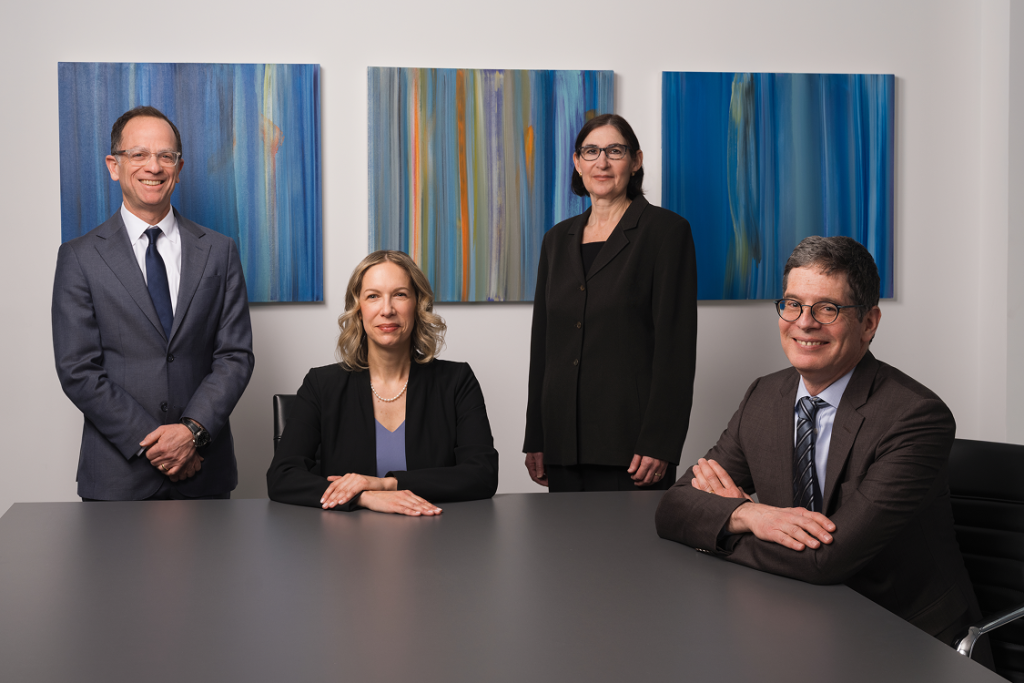 The four partners at Binder & Schwartz